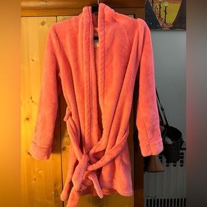 Pink fuzzy robe